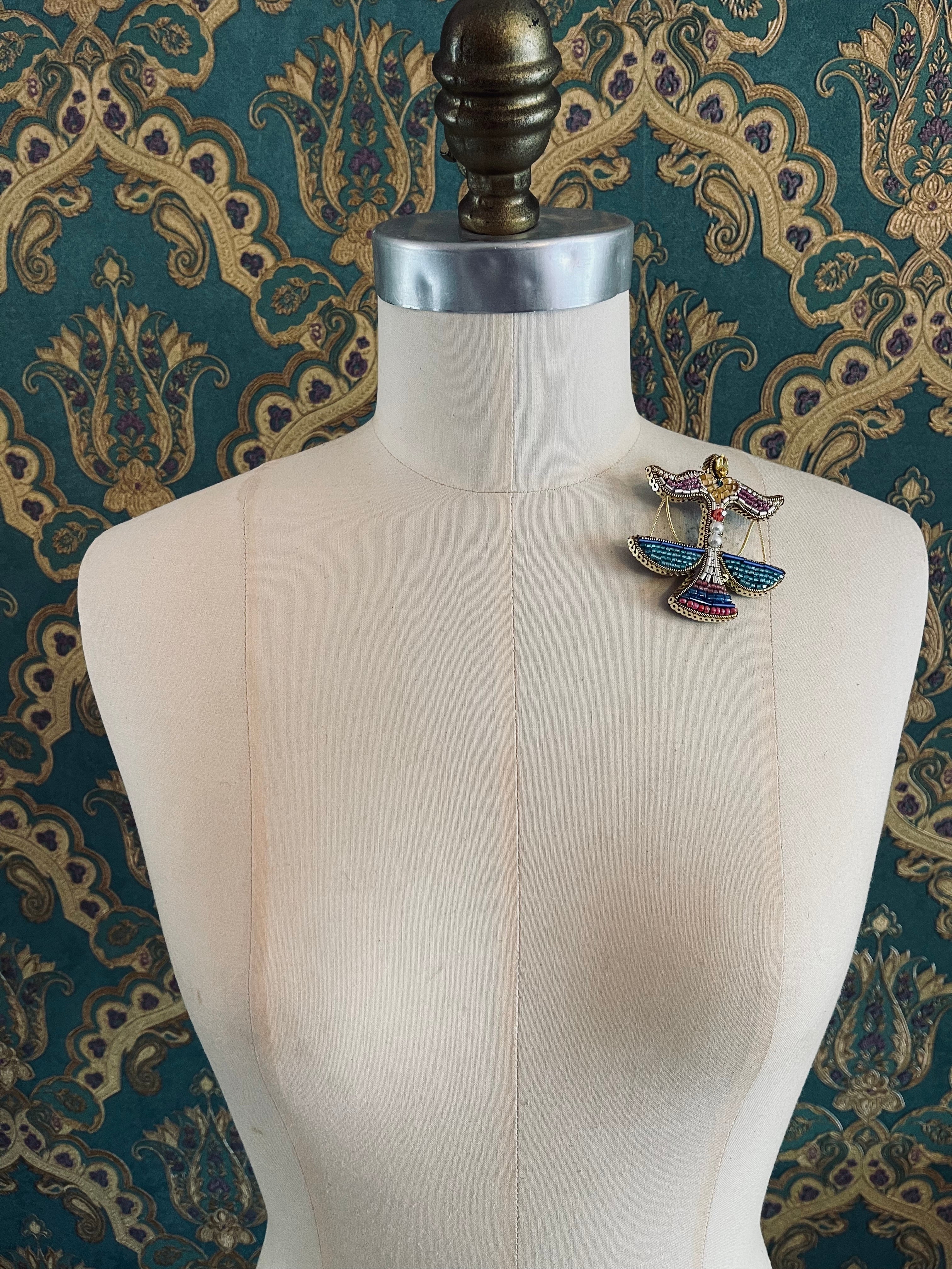 ZODIAC BROOCHES